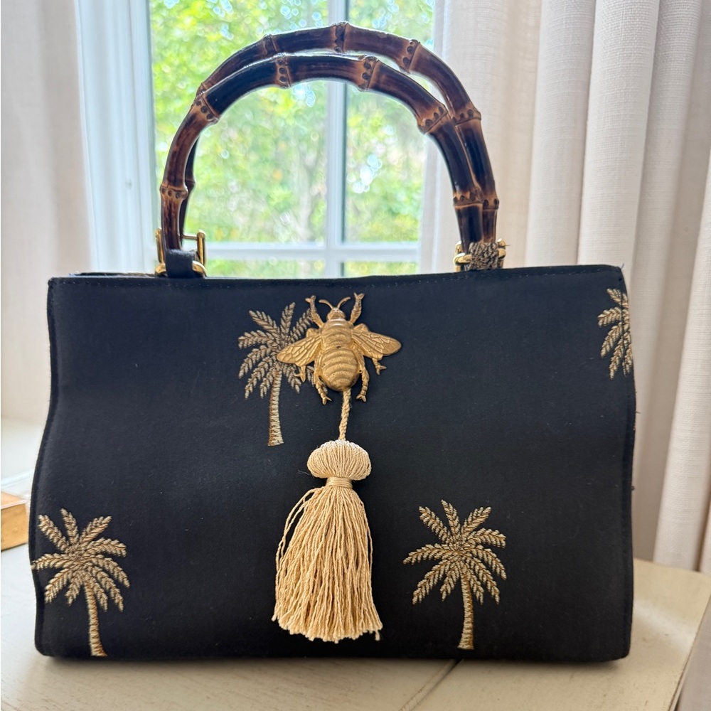 Elegant Black and Gold Satchel with Tropical Motifs